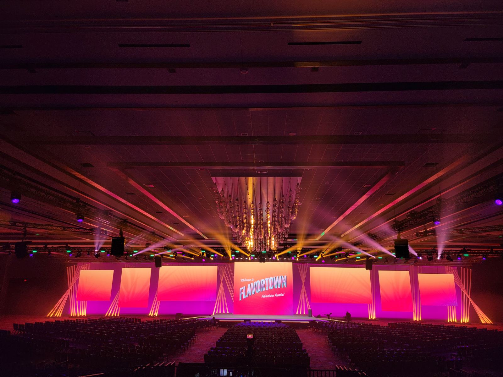 Pink and amber keynote stage